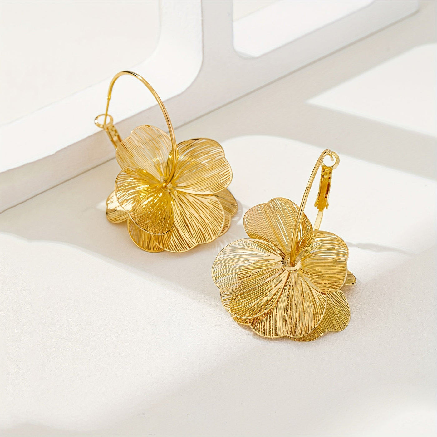 Exaggerated Gold Hollow Earrings