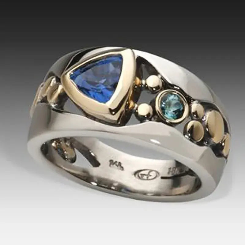 Elegant Vintage Ring Featuring Blue Crystal